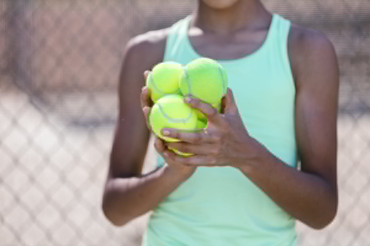 Pickleball doubles match on an outdoor court